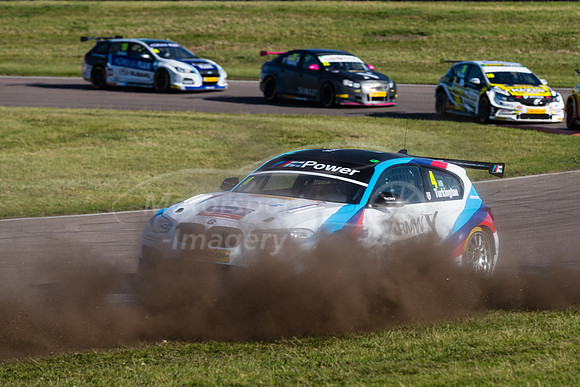 Colin Turkington driving through Tom Ingrams dust