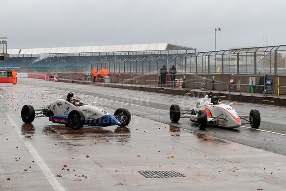 A wet early morning pit lane