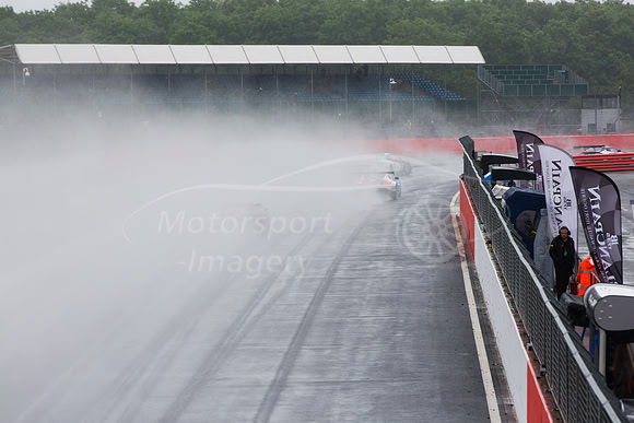 Race start, into the first corner