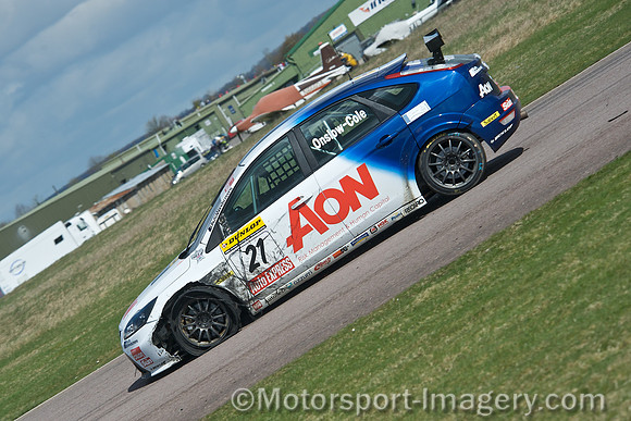 Tom Onslow-Cole with a flat tyre on the AON Focus